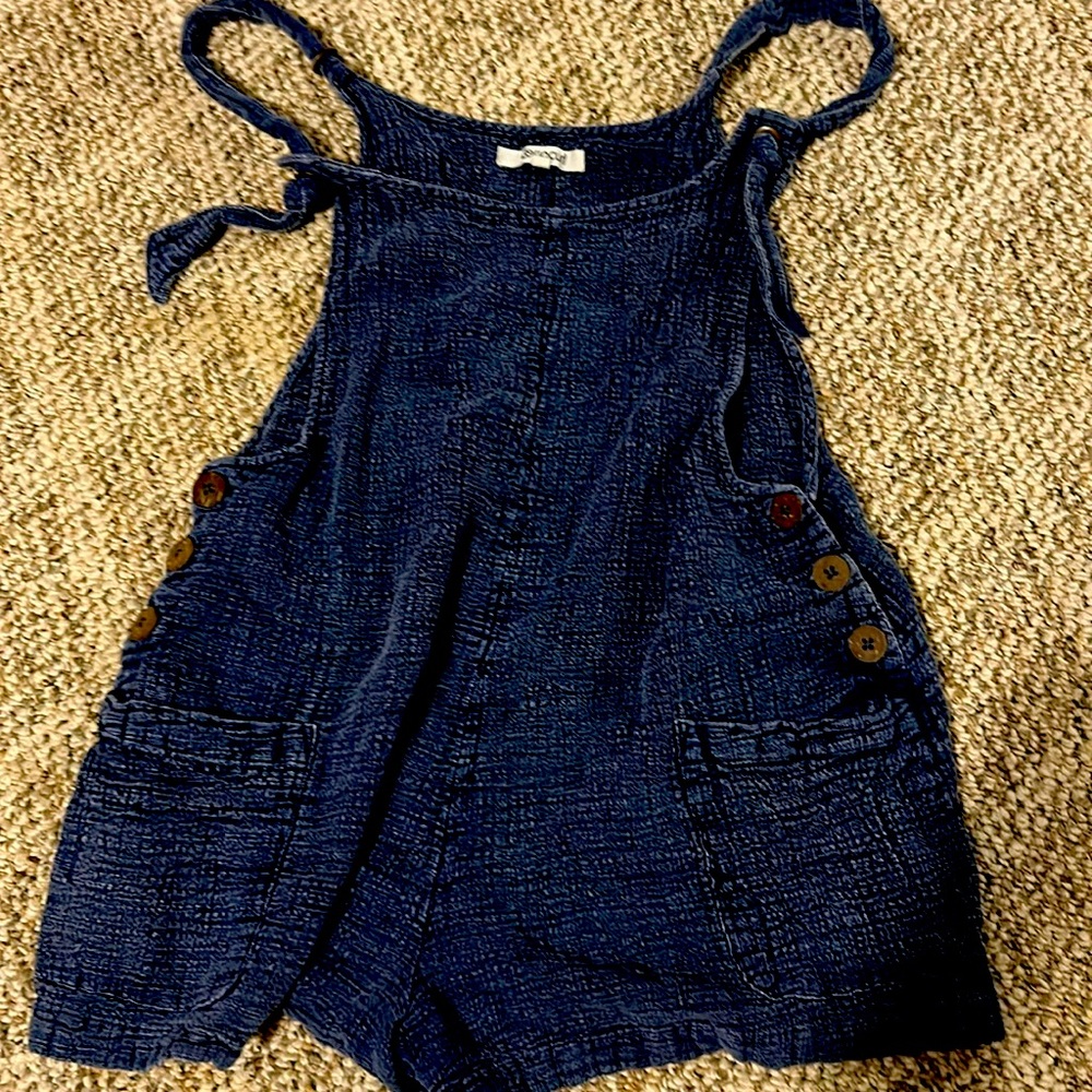 Blue distressed one piece size medium from rip curl